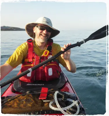 paul rowing in the sea